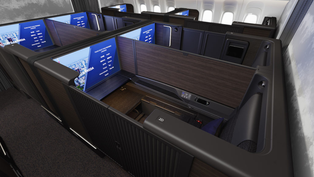 The central dividers in the first class suites can be lowered to create a shared space