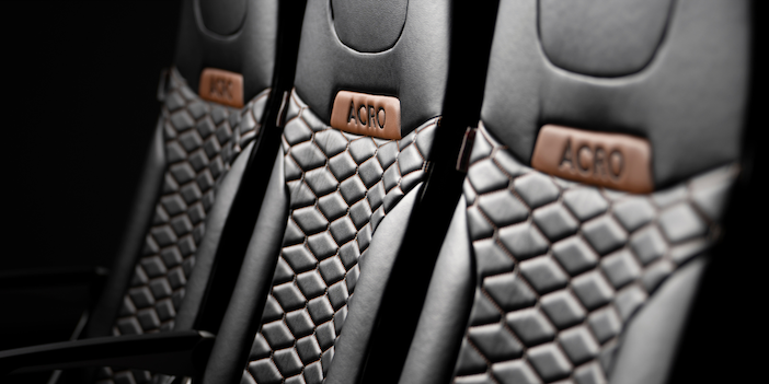 The Acro Series 9 lightweight economy-class seat, trimmed in black quilted leather