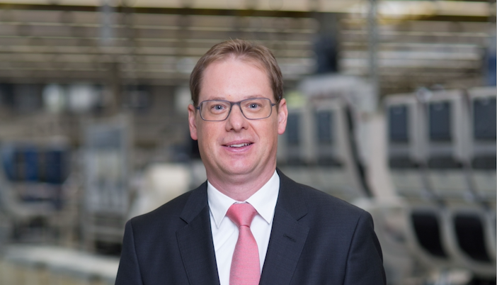 René Dankwerth from recaro, posing in a factory